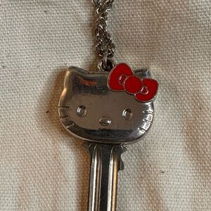 Vibtage 90’s Rare discontinued Hello Kitty Silver Key Necklace with Red Bow